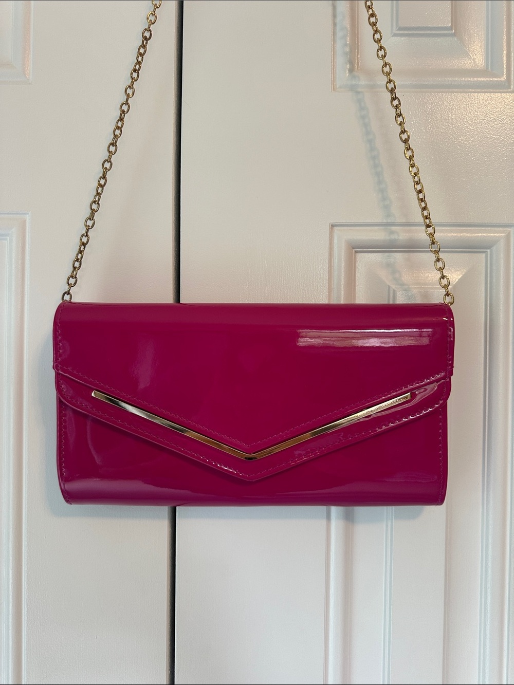 Aldo Magenta Patent Envelope Clutch with Gold Chain
